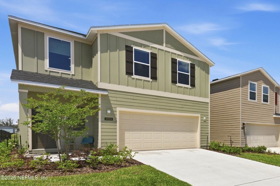 Front exterior of a new home in Holstein Crossing, Green Cove Springs, FL, highlighting curb appeal (Image 24).