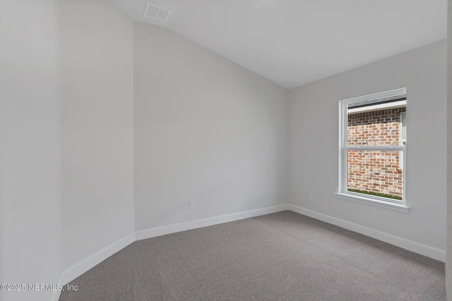 Spacious, unfurnished interior of a new home in Shadow Crest at Rolling Hills, Green Cove Springs (Image 20).