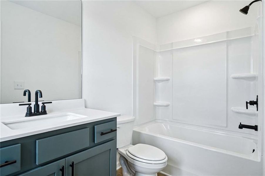 Furnished interior view inside a new home in Eastlyn Crossing, Flowery Branch (Image 11).