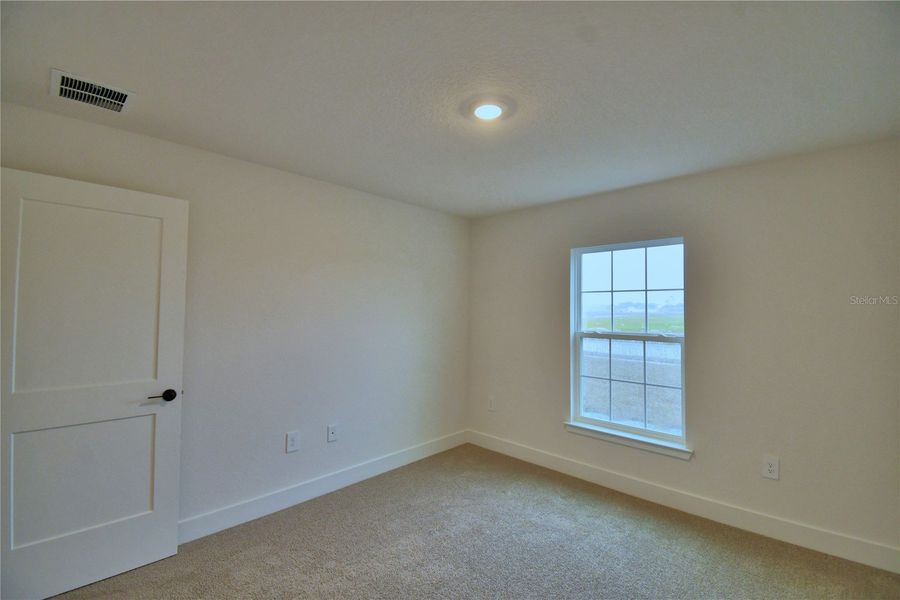 Spacious, unfurnished interior of a new home in Cadence Crossing, Auburndale (Image 46).