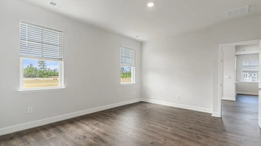 Representative unfurnished interior of a home built from the Covington by D.R. Horton in The Highlands at Cedar Hill Landing, Navassa (Image 26).