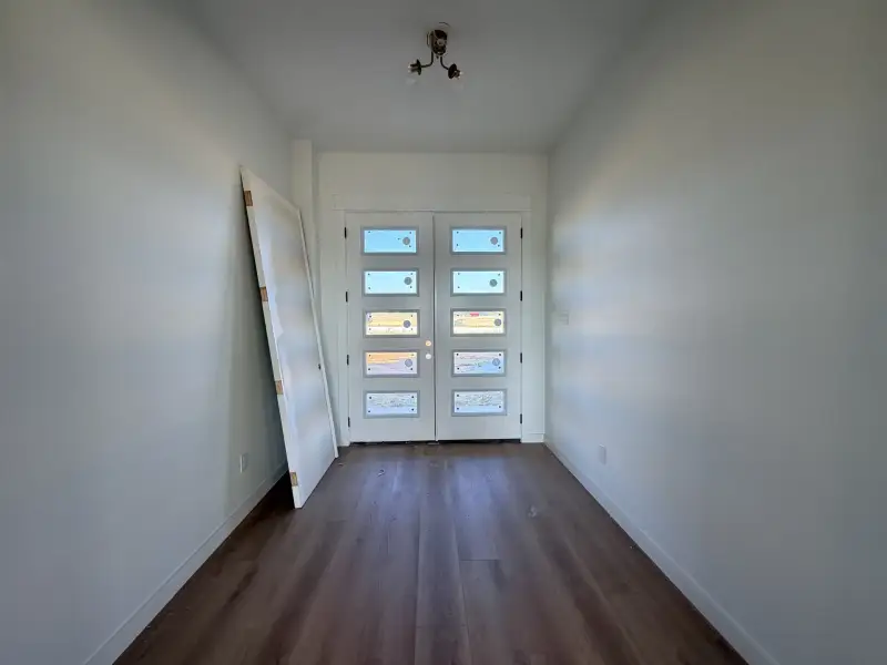 Spacious, unfurnished interior of a new home in Parallel Pastures, Poolville (Image 12).