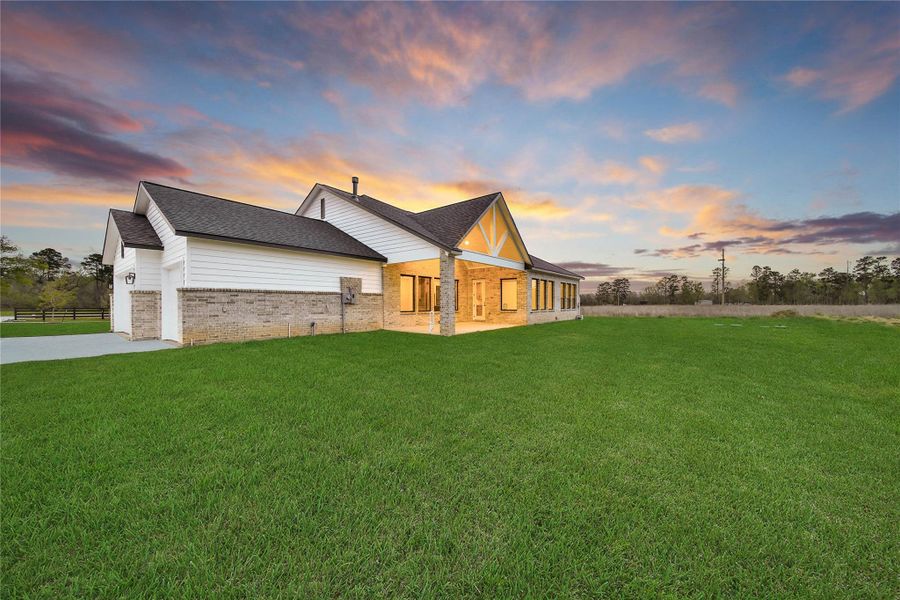Exterior details and patio area of a home in High Meadow Estates, New Waverly (Image 28).