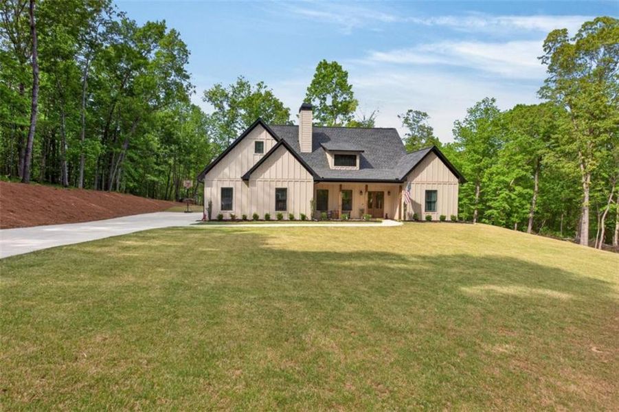 Front exterior of a new home in , Winston, GA, highlighting curb appeal (Image 1). Front exterior of a new home in , Winston, GA, highlighting curb appeal (Image 1).