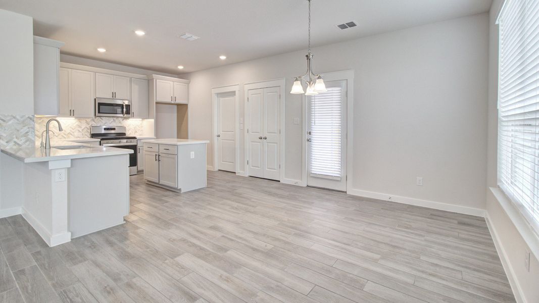 Representative furnished interior of a home built from the Majestic by Brightland Homes in Mostyn Springs, Magnolia (Image 6).