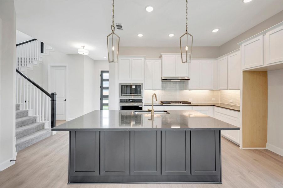 Furnished interior view inside a new home in Pomona - Grove Row Collection, Manvel (Image 8).