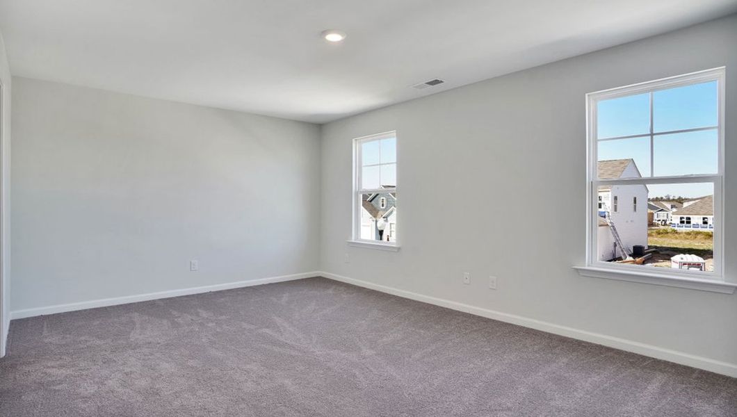 Representative unfurnished interior of a home built from the ROBIE by D.R. Horton in The Pines at Blake Farm, Wilmington (Image 15).