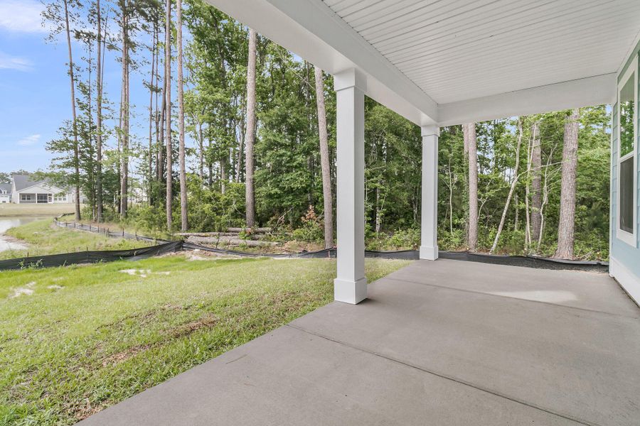 Exterior details and patio area of a home in Tidewater at Lakes of Cane Bay, Summerville (Image 3). Exterior details and patio area of a home in Tidewater at Lakes of Cane Bay, Summerville (Image 3).