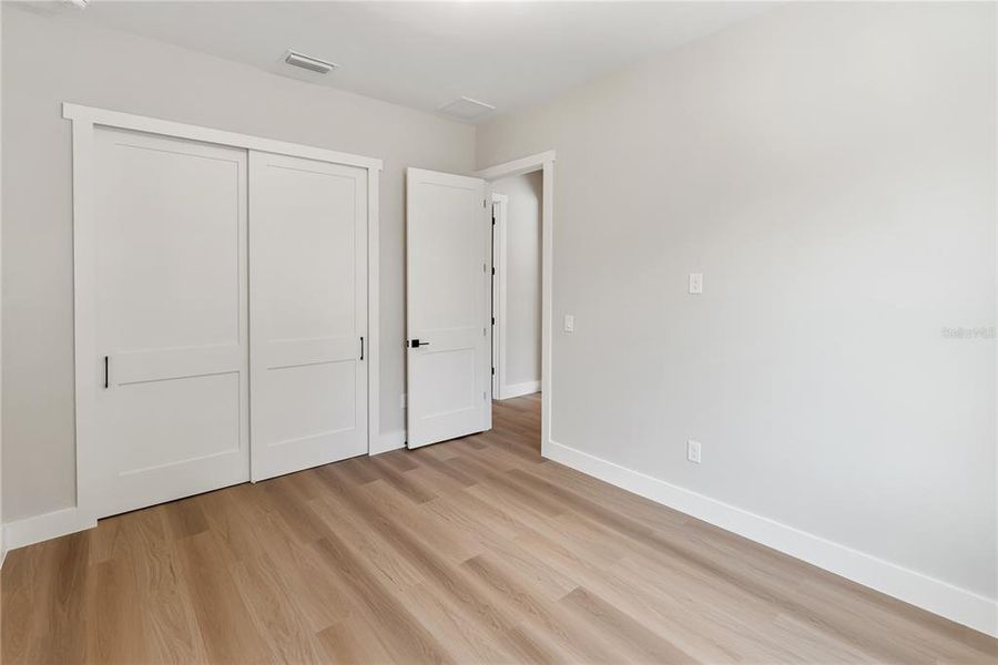 Spacious, unfurnished interior of a new home in , Port Charlotte (Image 53).