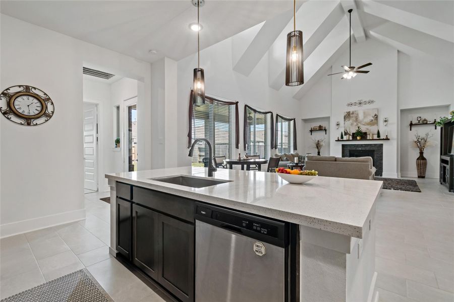 Kitchen opens to grand family room Kitchen opens to grand family room