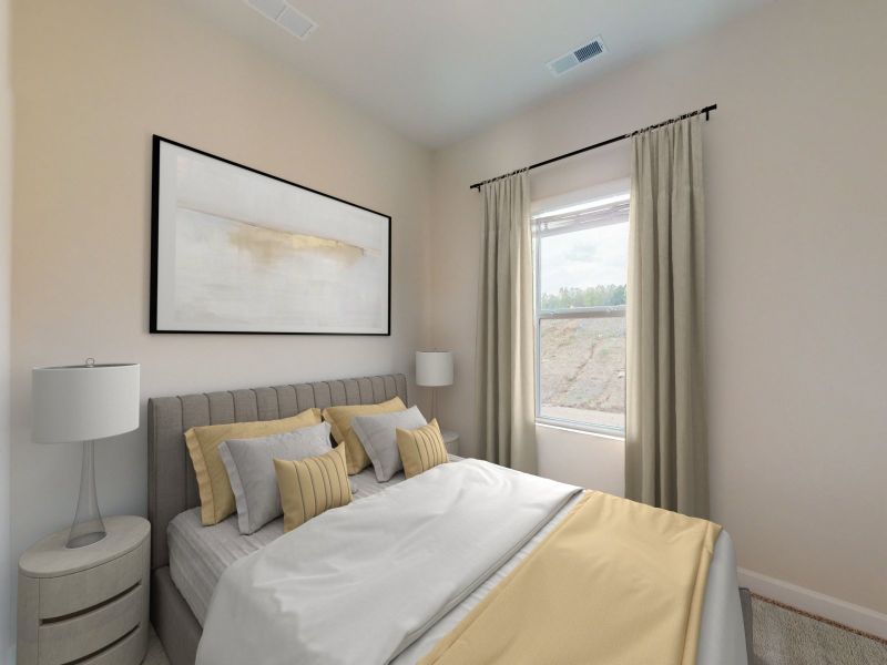 Downstairs bedroom in the Roswell floorplan at a Meritage Homes community in Garner, NC.