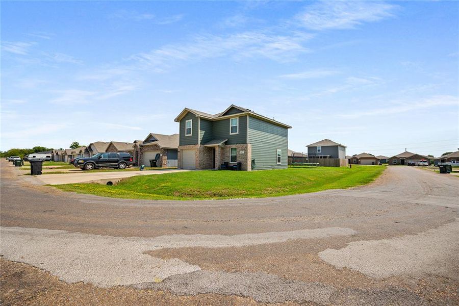 Front exterior of a new home in , Mabank, TX, highlighting curb appeal (Image 18).