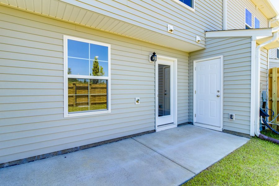 Exterior details and patio area of a home in Astoria, Columbia (Image 3).