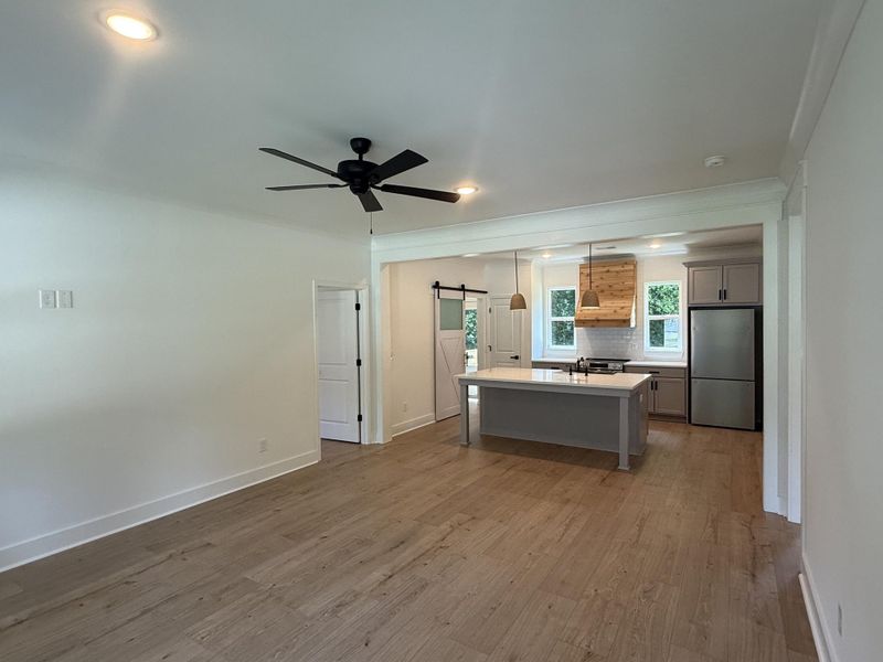 Spacious, unfurnished interior of a new home in , St. Matthews (Image 11).