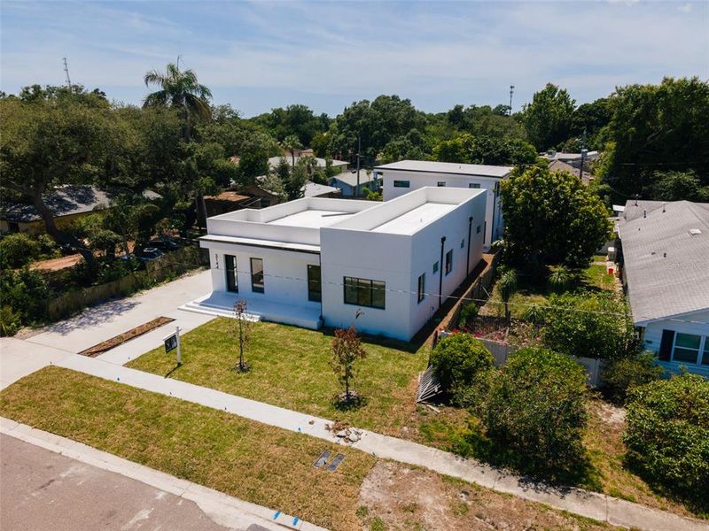 Front exterior of a new home in , St. Petersburg, FL, highlighting curb appeal (Image 2). Front exterior of a new home in , St. Petersburg, FL, highlighting curb appeal (Image 2).