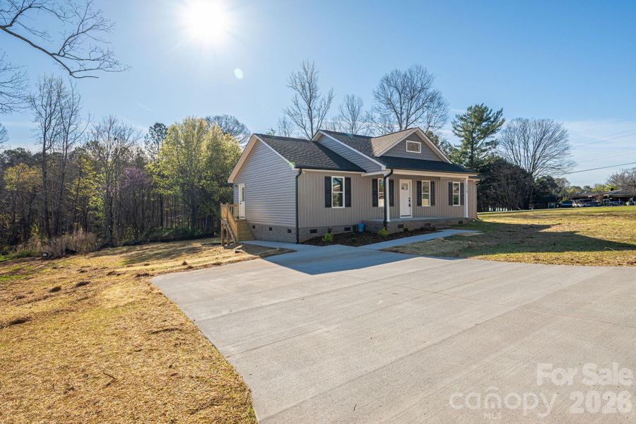 Front exterior of a new home in , Lincolnton, NC, highlighting curb appeal (Image 18).
