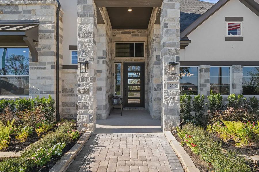 Exterior details and patio area of a home in Riceland 60',65',70', Mont Belvieu (Image 3). Exterior details and patio area of a home in Riceland 60',65',70', Mont Belvieu (Image 3).