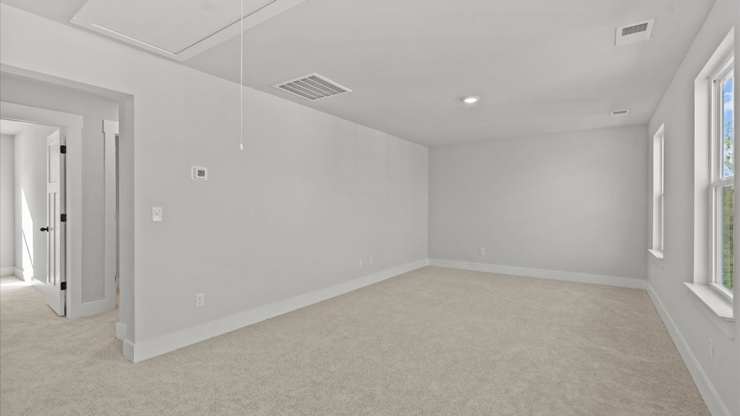 Accomplished design meets restful elegance in this exclusive primary suite by DRB Homes