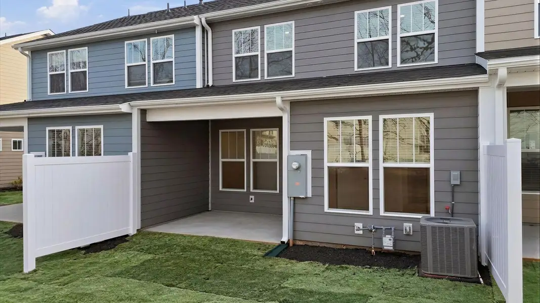 Established charm meets functional outdoor living with a spacious rear covered porch at Pelham Crossing