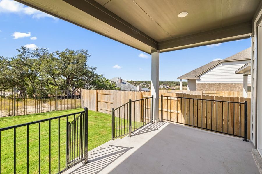 Exterior details and patio area of a home in Terrace Collection at Lariat, Liberty Hill (Image 23). Exterior details and patio area of a home in Terrace Collection at Lariat, Liberty Hill (Image 23).