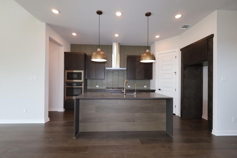 Furnished interior view inside a new home in Wolf Ranch, Georgetown (Image 7).