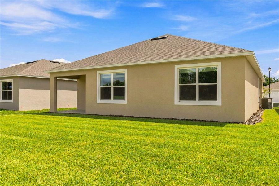 Exterior details and patio area of a home in Ironwood, Daytona Beach (Image 20).
