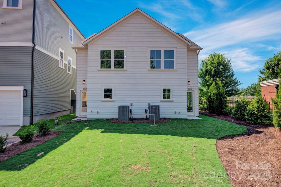 Front exterior of a new home in , Davidson, NC, highlighting curb appeal (Image 12).