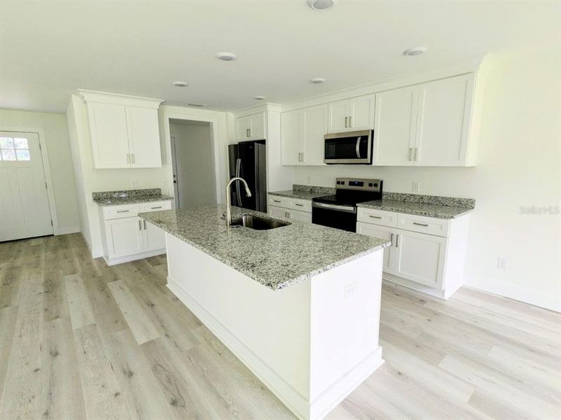 Furnished interior view inside a new home in , Fort Meade (Image 4).
