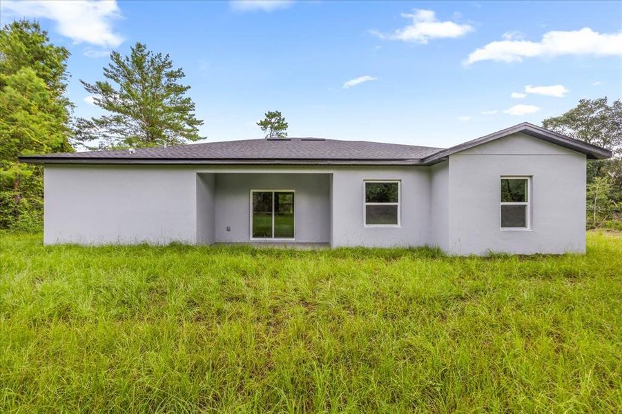 Front exterior of a new home in , Ocala, FL, highlighting curb appeal (Image 22). Front exterior of a new home in , Ocala, FL, highlighting curb appeal (Image 22).
