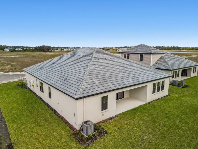 Exterior details and patio area of a home in River Preserve Estates, Parrish (Image 39).