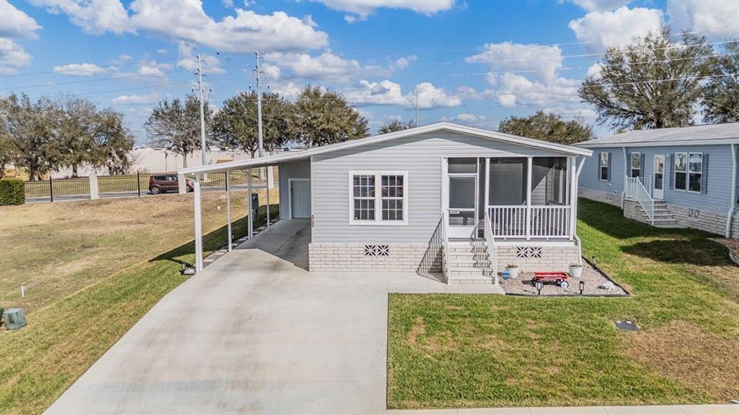Exterior details and patio area of a home in , Zephyrhills (Image 25).