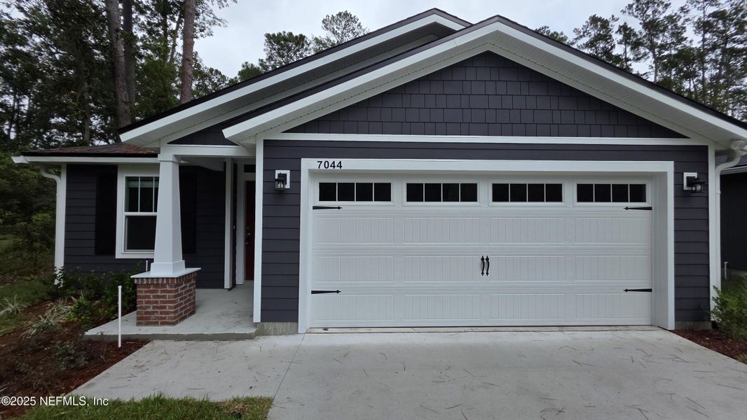 Front exterior of a new home in , Jacksonville, FL, highlighting curb appeal (Image 1). Front exterior of a new home in , Jacksonville, FL, highlighting curb appeal (Image 1).