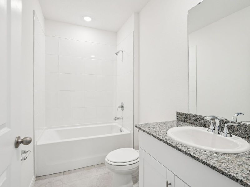 Furnished interior view inside a new home in Wynnstone - Signature Series, Davenport (Image 5).