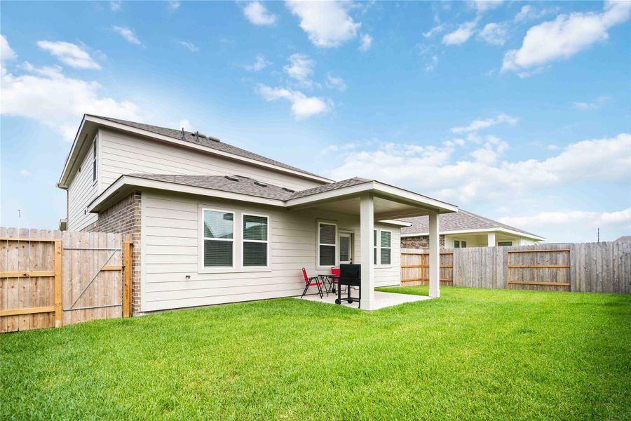Exterior details and patio area of a home in Ascend at Legends Bay, Baytown (Image 3). Exterior details and patio area of a home in Ascend at Legends Bay, Baytown (Image 3).