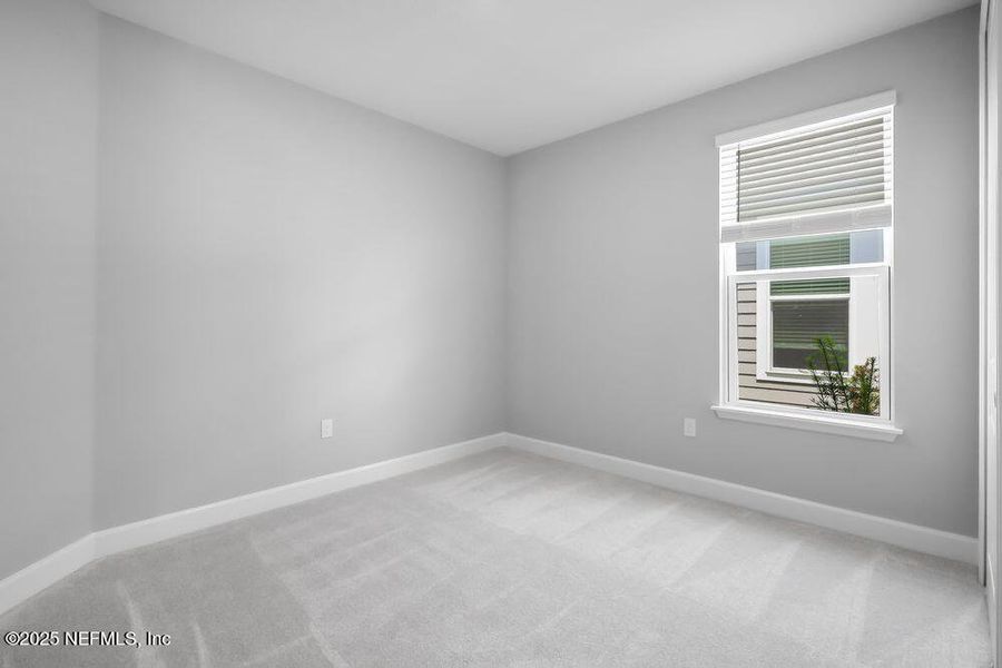 Spacious, unfurnished interior of a new home in Colbert Landings, Palm Coast (Image 16).