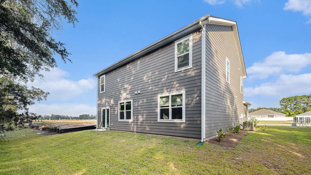 Exterior details and patio area of a home in Auberon Woods, Conway (Image 3). Exterior details and patio area of a home in Auberon Woods, Conway (Image 3).