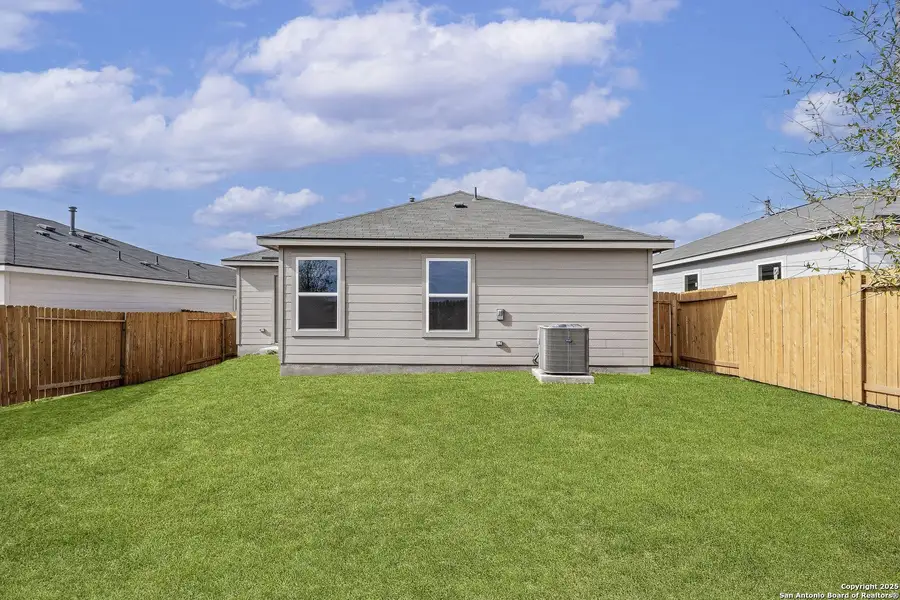 Front exterior of a new home in Preserve at Medina, Von Ormy, TX, highlighting curb appeal (Image 13).