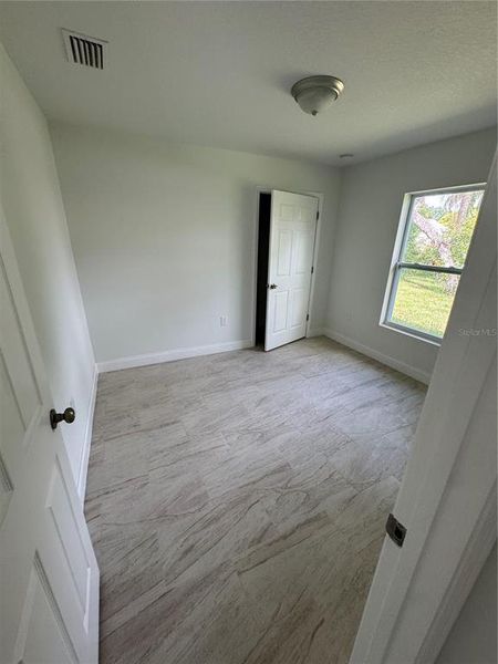 Spacious, unfurnished interior of a new home in , Deltona (Image 29).