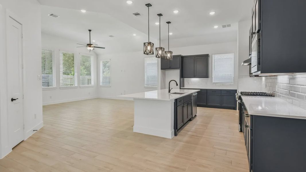 Furnished interior view inside a new home in Artavia, Conroe (Image 7).