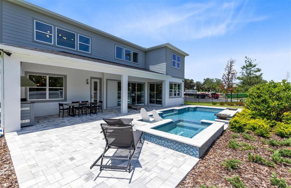 Exterior details and patio area of a home in The Estates at Nona Sound, Orlando (Image 23). Exterior details and patio area of a home in The Estates at Nona Sound, Orlando (Image 23).