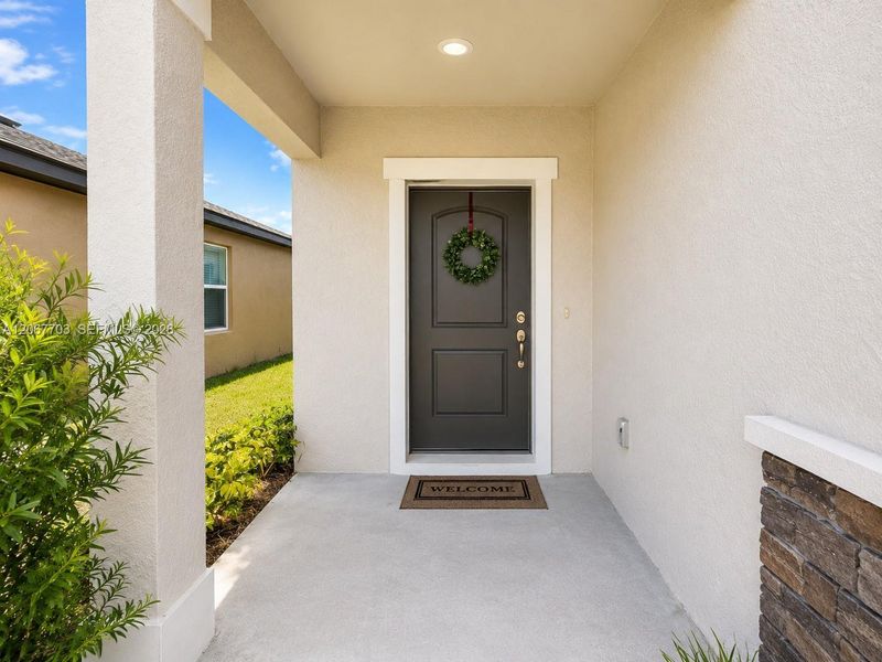 Exterior details and patio area of a home in Summerwoods, Parrish (Image 4).