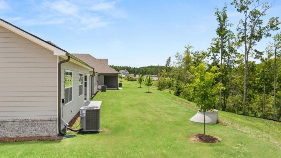 Exterior details and patio area of a home in Hamptons at Riverwood North, Dallas (Image 4).