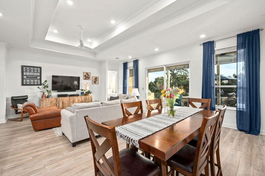 The open dining space flows beautifully into the kitchen and living areas, perfect for gatherings The open dining space flows beautifully into the kitchen and living areas, perfect for gatherings