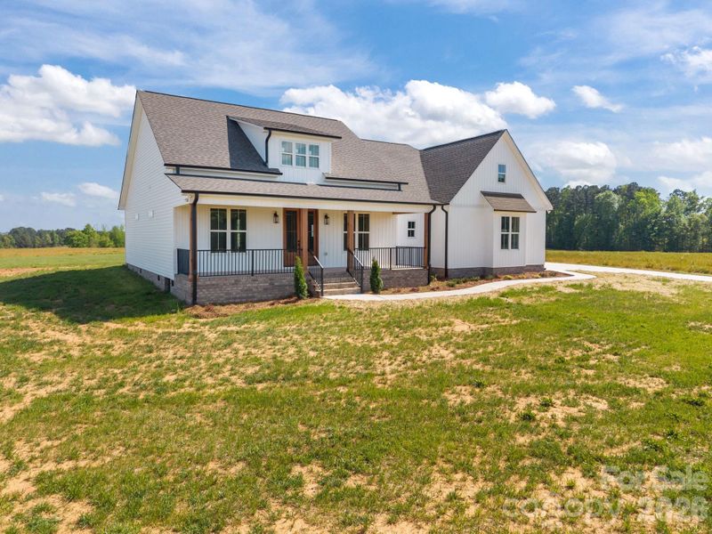 Exterior details and patio area of a home in , China Grove (Image 3).