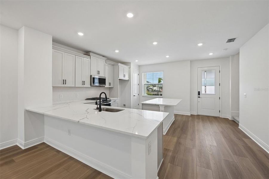 Furnished interior view inside a new home in SeaFlower, Bradenton (Image 11).