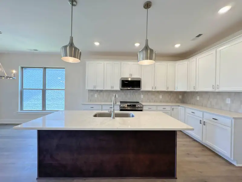 Furnished interior view inside a new home in The Paddock, Gallatin (Image 3).