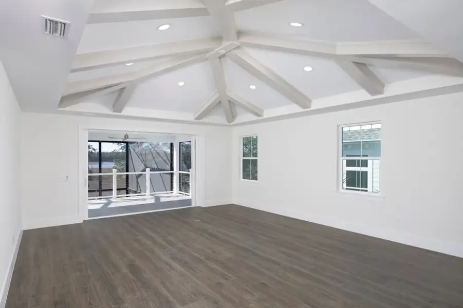 Representative unfurnished interior of a home built from the Grand Spinnaker by Minto Communities in Latitude Margaritaville Watersound, Panama City Beach (Image 20).