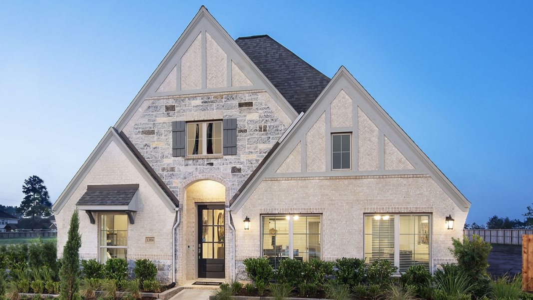 Front exterior of a new home in Candela, Richmond, TX, highlighting curb appeal (Image 34).