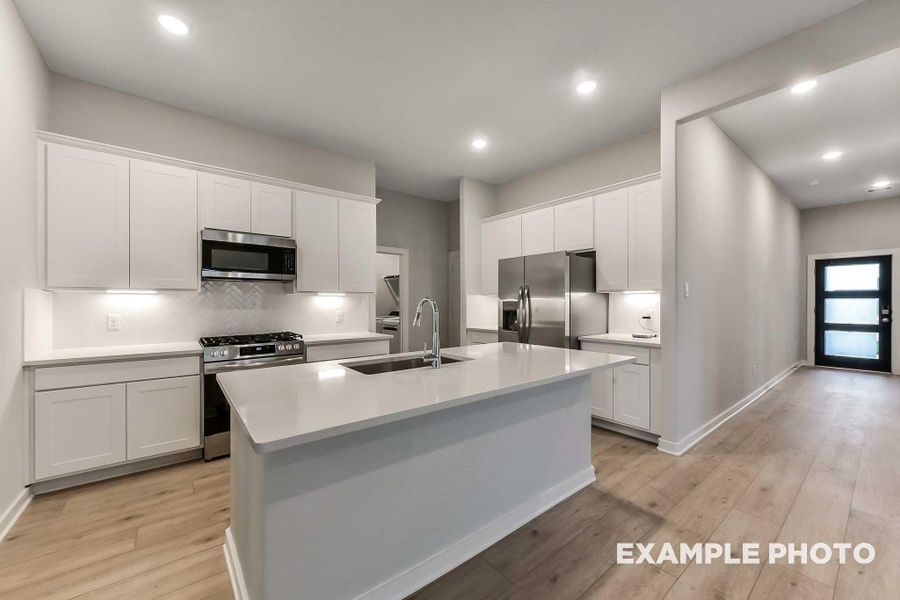 Furnished interior view inside a new home in Sunterra, Katy (Image 8).