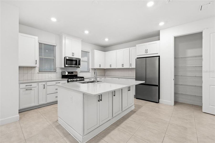 Furnished interior view inside a new home in Harvest At Ovation 50s, Winter Garden (Image 11).